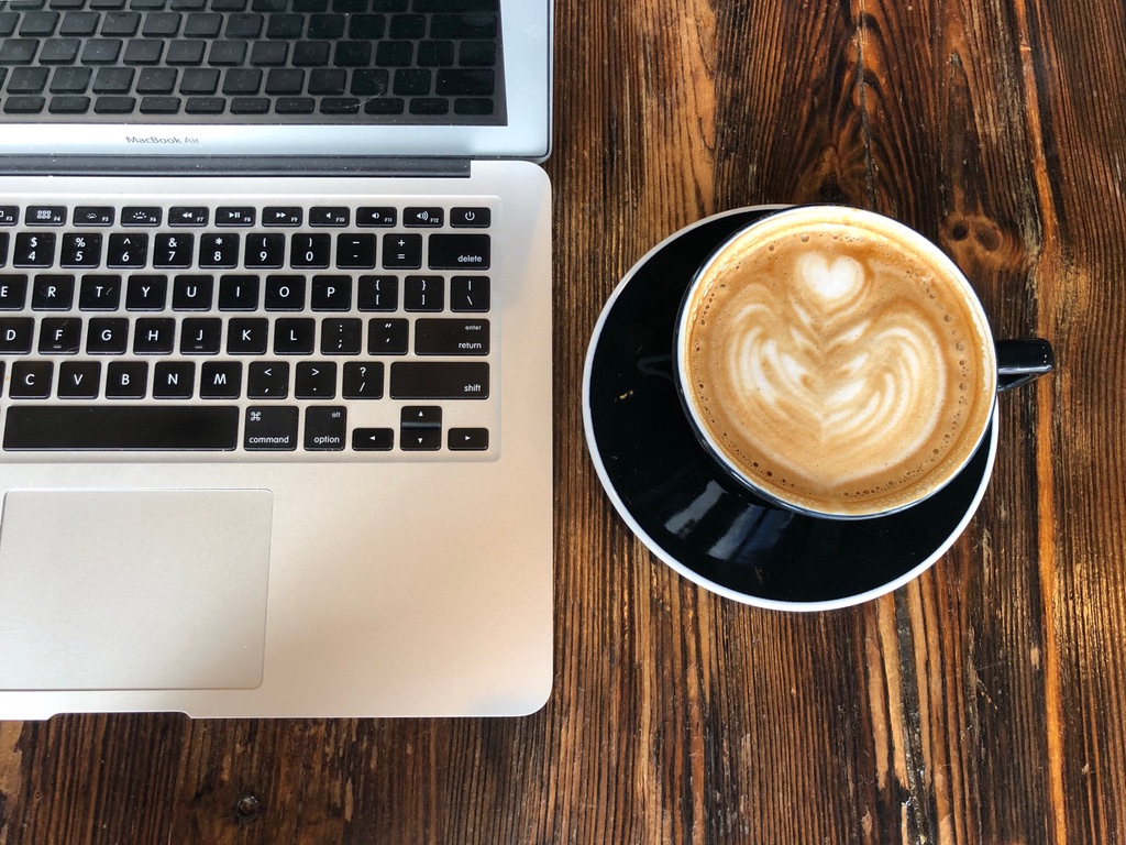 on writing: stains on a white couch
laptop and a latte